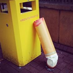 Cigarette by bin